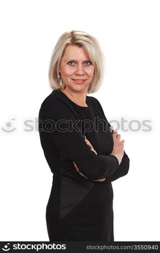 Mature businesswoman standing with arms crossed against isolated on white background