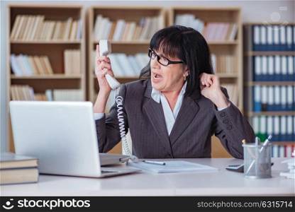 Mature businesswoman working in the office
