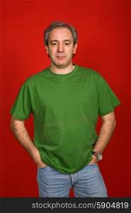 mature casual man on a red background