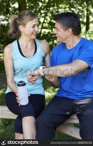 Mature Couple Exercising In Countryside Together