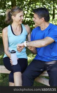Mature Couple Exercising In Countryside Together