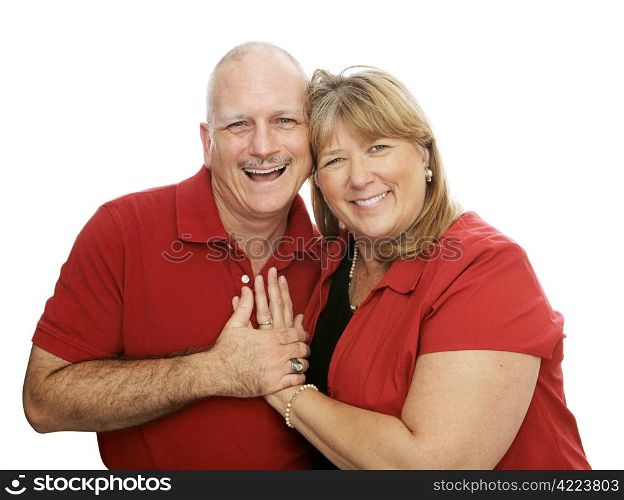Mature couple having fun and laughing together. Isolated on white.