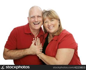 Mature couple having fun and laughing together. Isolated on white.