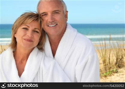 Mature couple in bathrobe