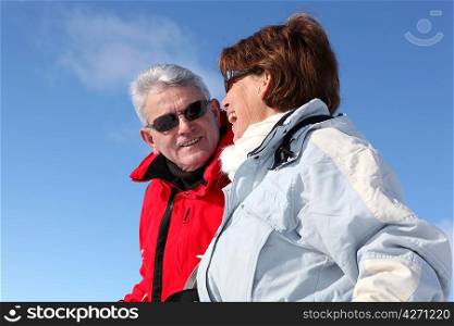 Mature couple in winter coats