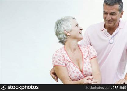 Mature couple looking at each other and smiling