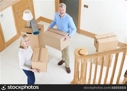 Mature Couple Moving In To New Home