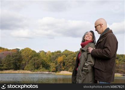 Mature couple near a lake