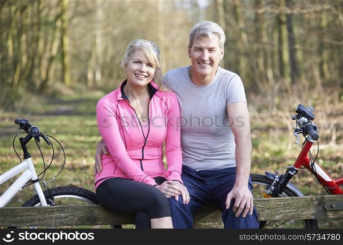 Mature Couple On Cycle Ride In Countryside Together