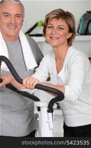 Mature couple on treadmill