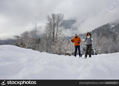 Mature couple skiing