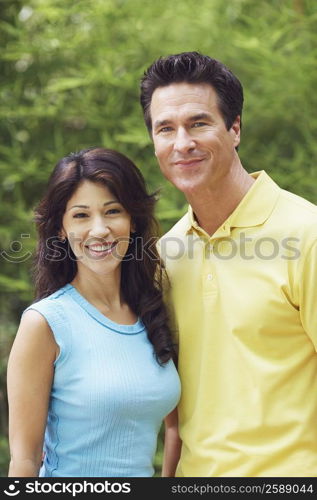 Mature couple standing together and smiling