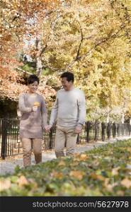 Mature Couple Talking a Walk in the Park