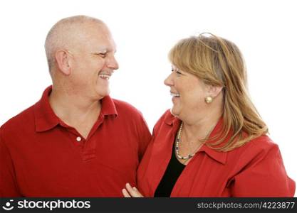 Mature couple with same sense of humor. Isolated on white.