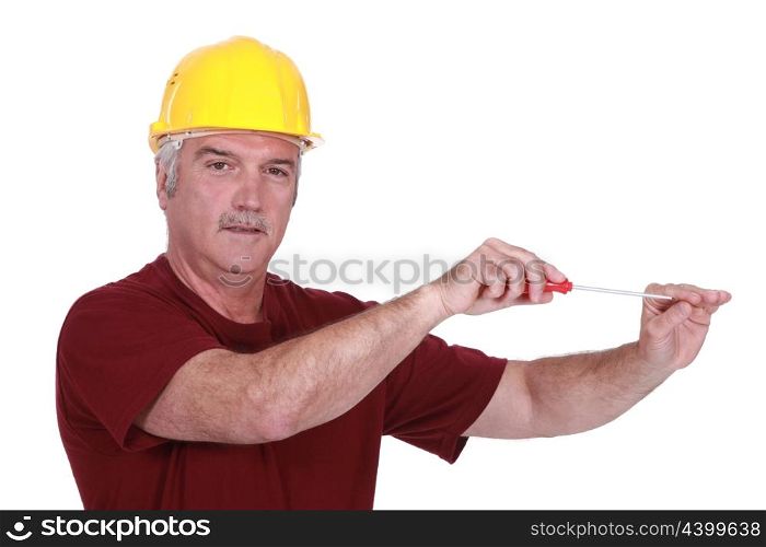 mature craftsman using screwdriver
