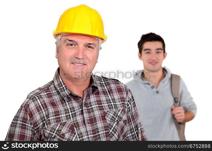 mature craftsman with apprentice