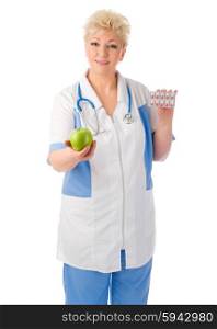 Mature doctor with apple and pills isolated