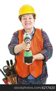 Mature female construction worker holding a power drill.