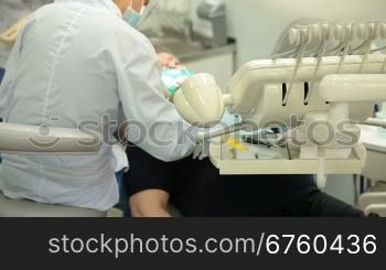 Mature female patient at the dentist surgery