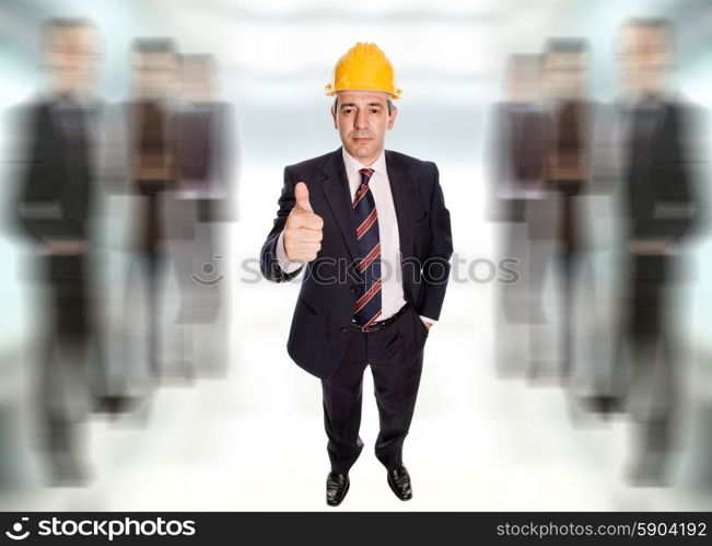 mature happy architect going thumb up with his hand