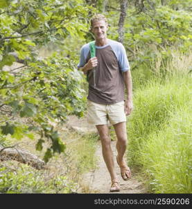 Mature man hiking in a forest