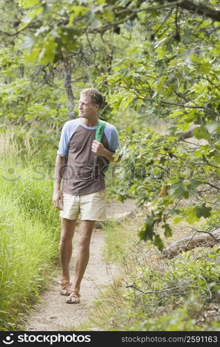 Mature man hiking in a forest