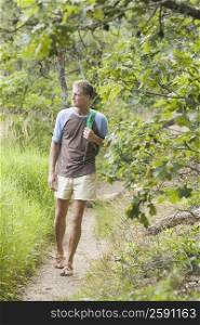 Mature man hiking in a forest