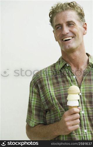Mature man holding an ice cream cone