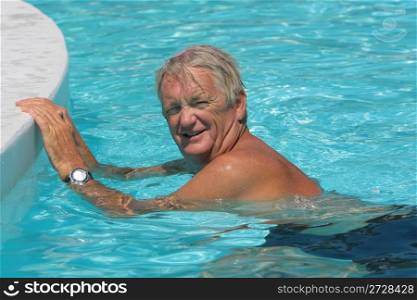 mature man in the pool
