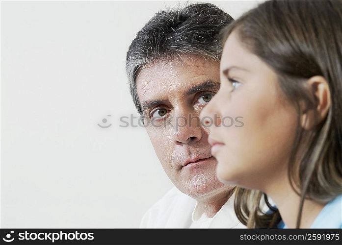 Mature man looking at her daughter