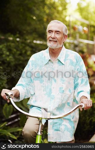 Mature man riding a bicycle