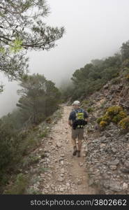 Mature Man trekking in the mountain