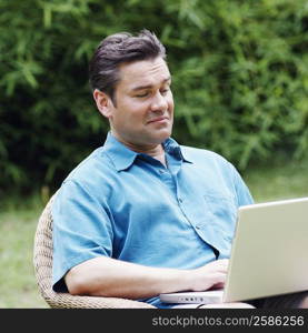Mature man using a laptop
