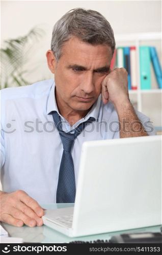 Mature man working at home