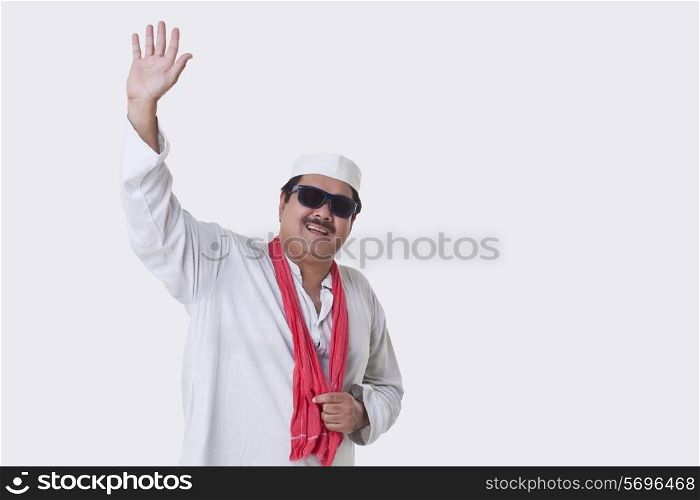 Mature politician greeting over white background