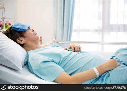 mature senior man Patient sleeping in hospital bed