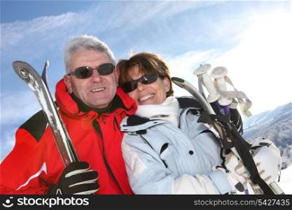Mature ski couple