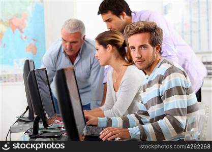 Mature students at computers