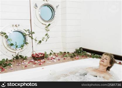 Mature woman in a bathtub