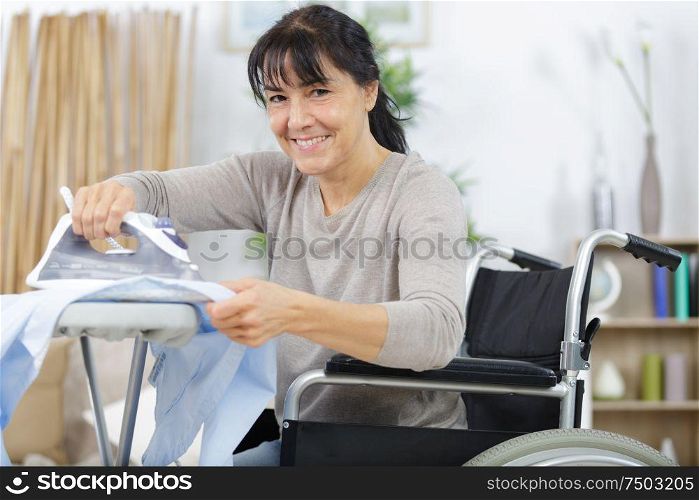 mature woman in wheelchair irons clothes