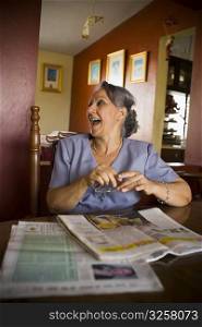 Mature woman looking away and laughing
