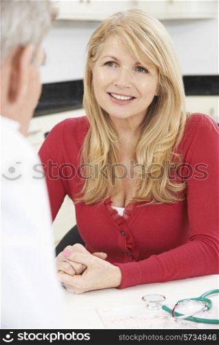 Mature Woman Meeting With Doctor In Surgery