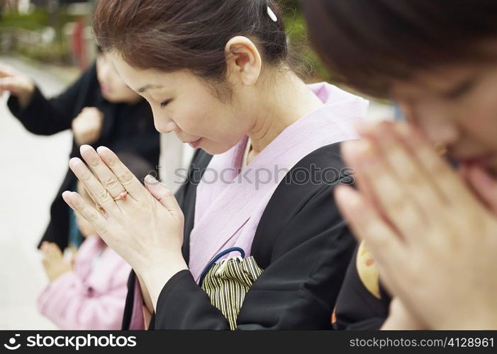 Mature woman praying