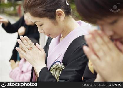 Mature woman praying