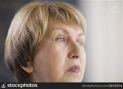 Mature woman with downturned mouth