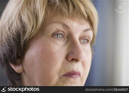 Mature woman with downturned mouth