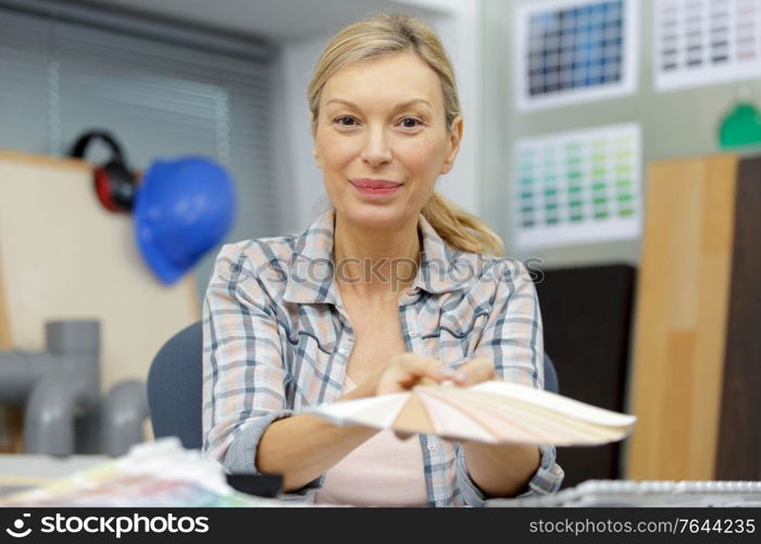 mature woman working in her workshop