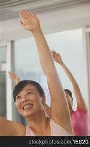 Mature women exercising in the gym