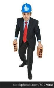 mature worker holding two bricks, isolated on white