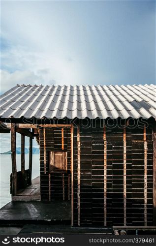 MAY 20, 2014 Koh Lanta , Krabi, Thailand - Old black wooden local ocean house in old town district of fisherman village in Koh Lanta. Famouse island destination